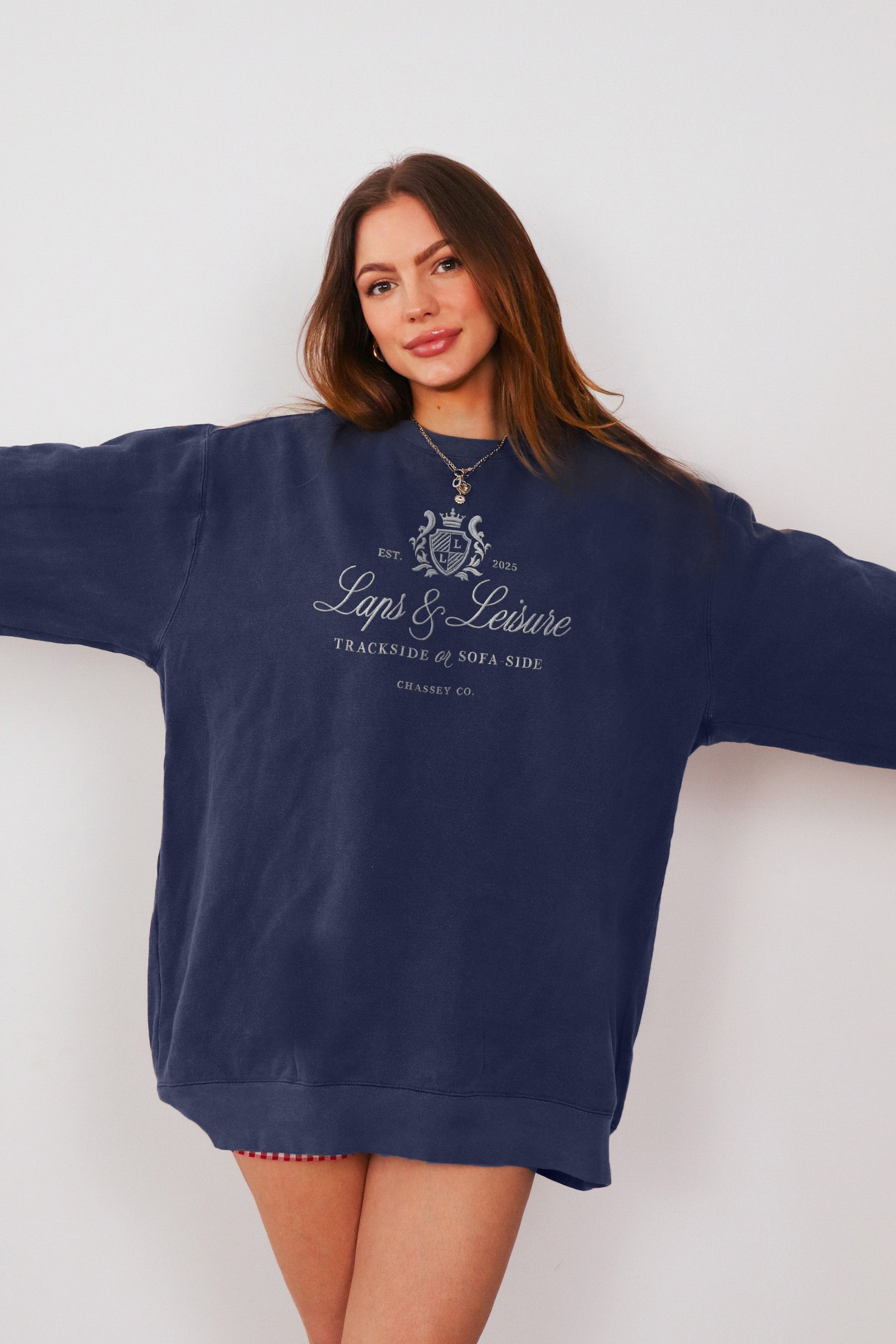 Model wearing Laps & Leisure embroidered sweatshirt in navy