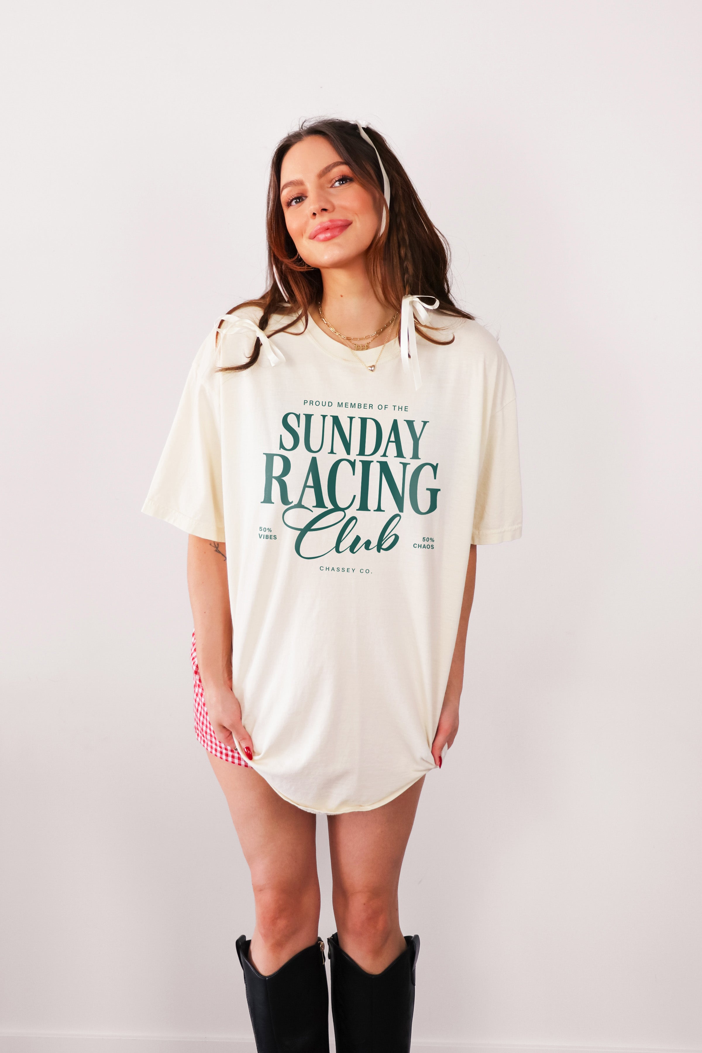 Sunday Racing Club tee on model, relaxed fit, cream tee with green text